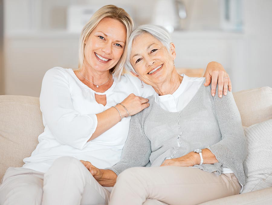 Woman with mother on couch